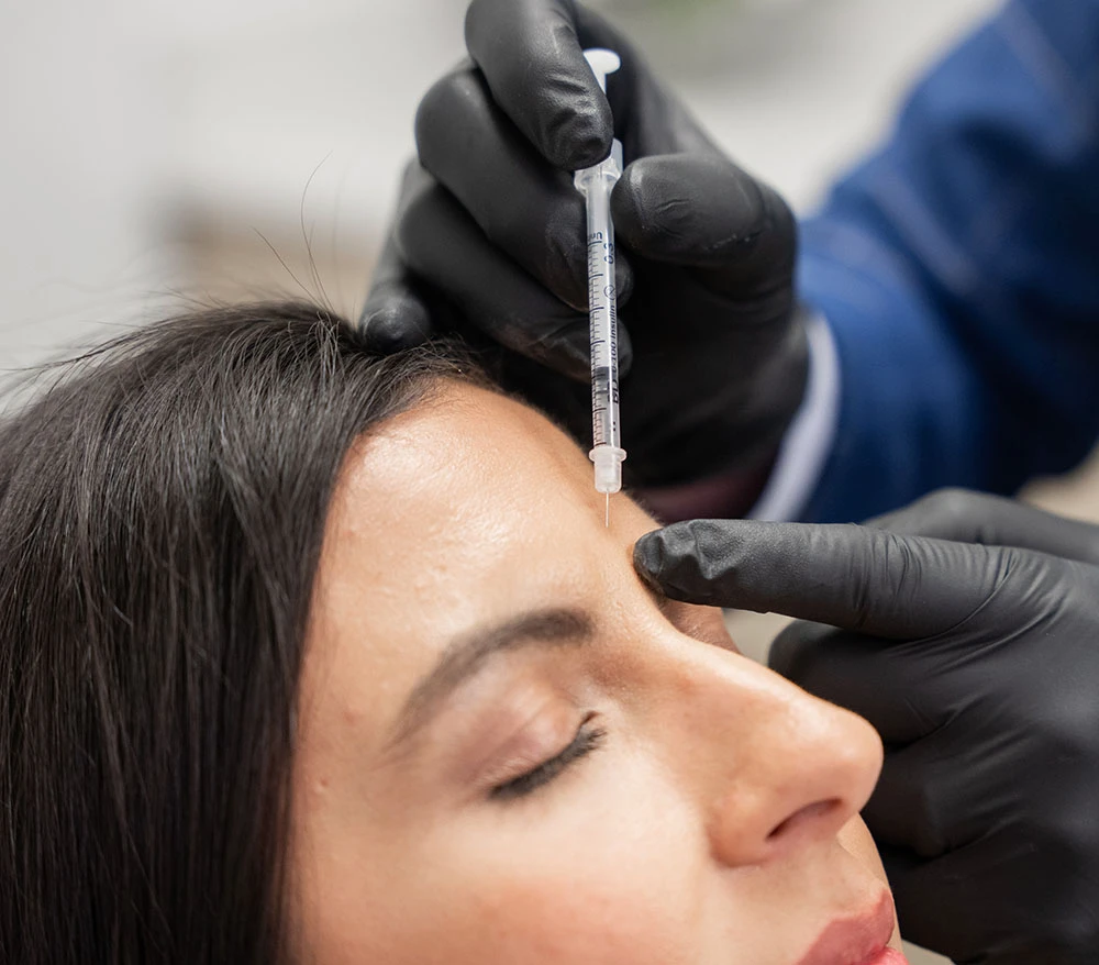 woman receiving botox injection | Raggio Facial Plastic Surgery