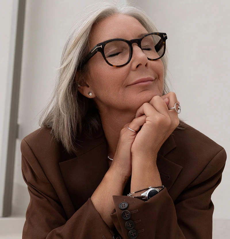 older woman with glasses with facelift | Raggio Facial Plastic Surgery