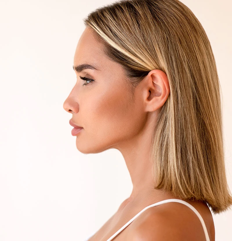 short haired womans profile otoplasty | Raggio Facial Plastic Surgery